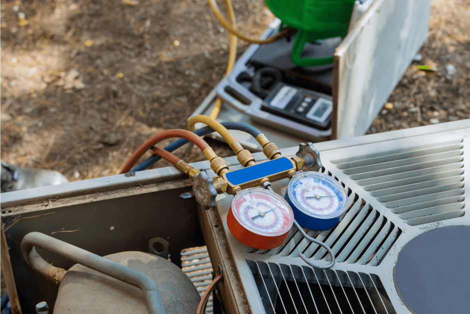Technician performing HVAC maintenance on a residential air conditioning unit in Wisconsin